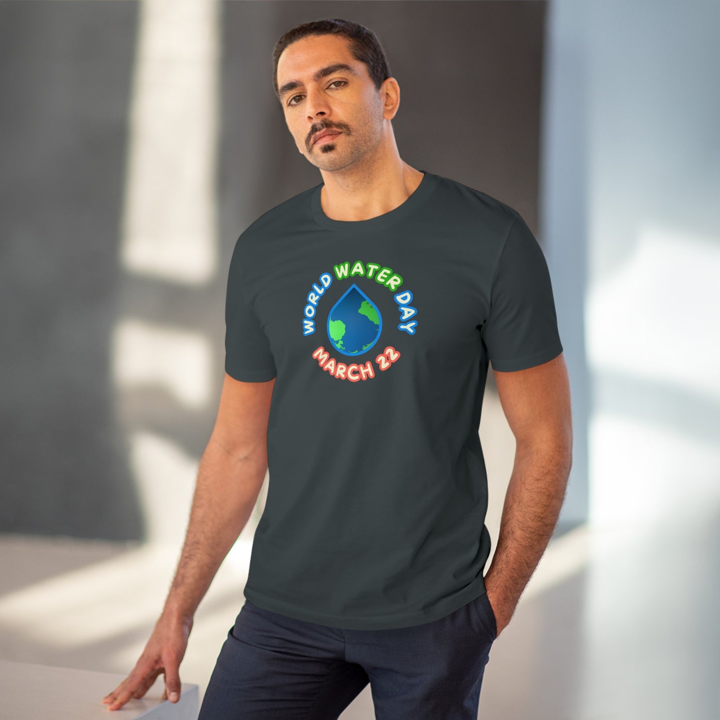 World Water Day, Model wearing a GR@ON T-Shirt made from organic cotton, featuring a stylish and sustainable design. GR@ON T-Shirts: Sustainable style, everyday comfort.