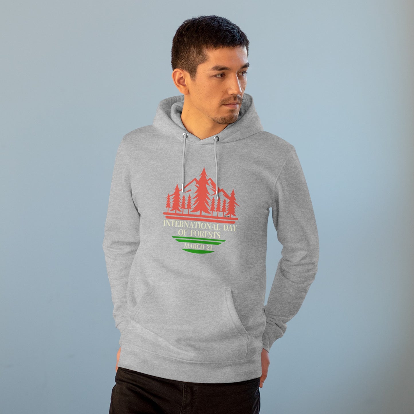 International Day of Forests, Model wearing a GR@ON Hoodie made from organic cotton, featuring a stylish and sustainable design. GR@ON Hoodies: Sustainable warmth, stylish comfort.