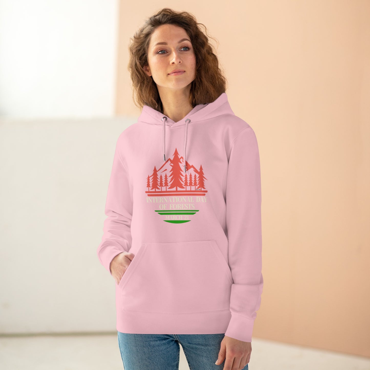 International Day of Forests, Model wearing a GR@ON Hoodie made from organic cotton, featuring a stylish and sustainable design. GR@ON Hoodies: Sustainable warmth, stylish comfort.