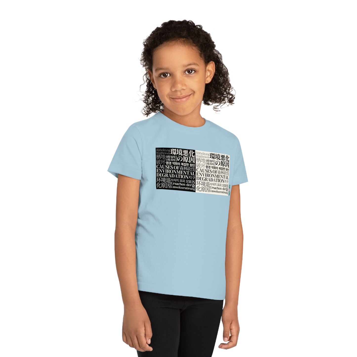 Child wearing a GR@ON Kids T-Shirt made from organic cotton, featuring a fun and colorful design. GR@ON Kids T-Shirts: Sustainable style, fun designs.