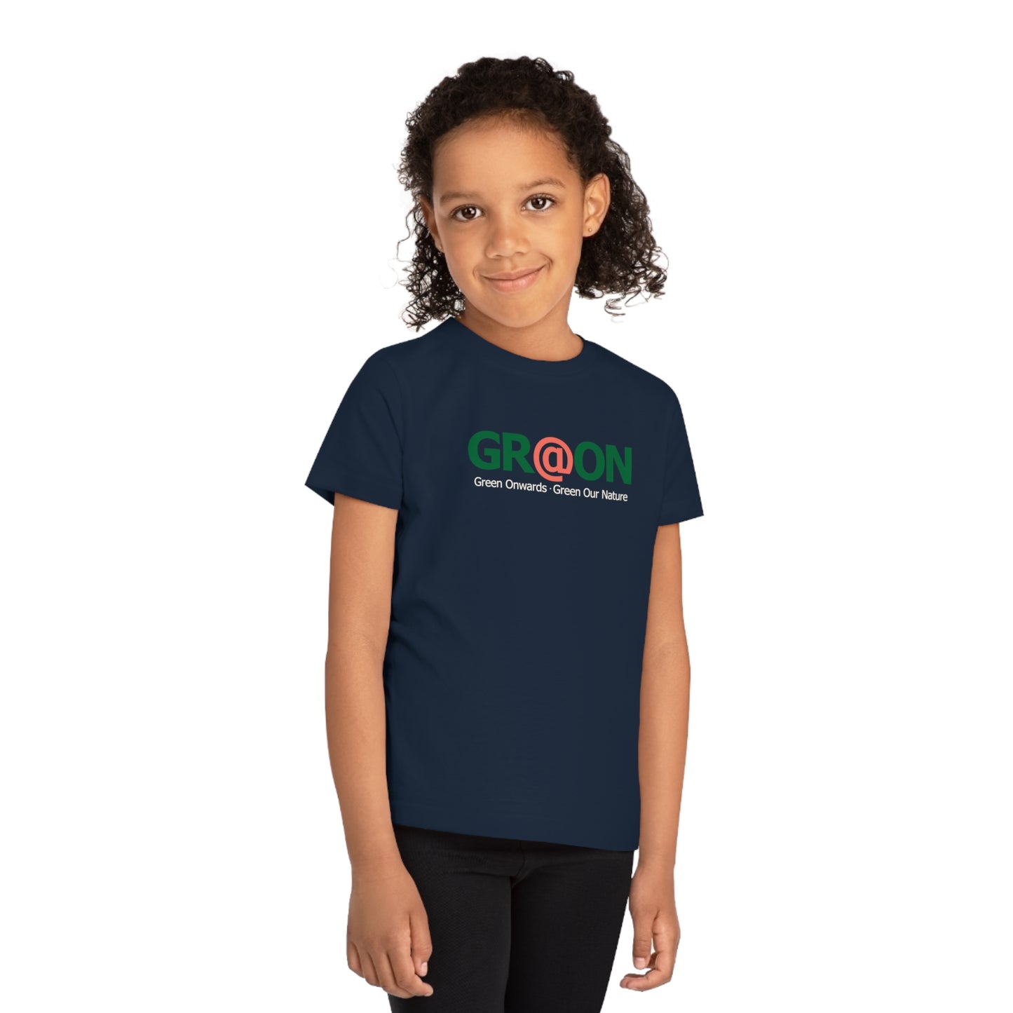 Child wearing a GR@ON Kids T-Shirt made from organic cotton, featuring a fun and colorful design. GR@ON Kids T-Shirts: Sustainable style, fun designs.