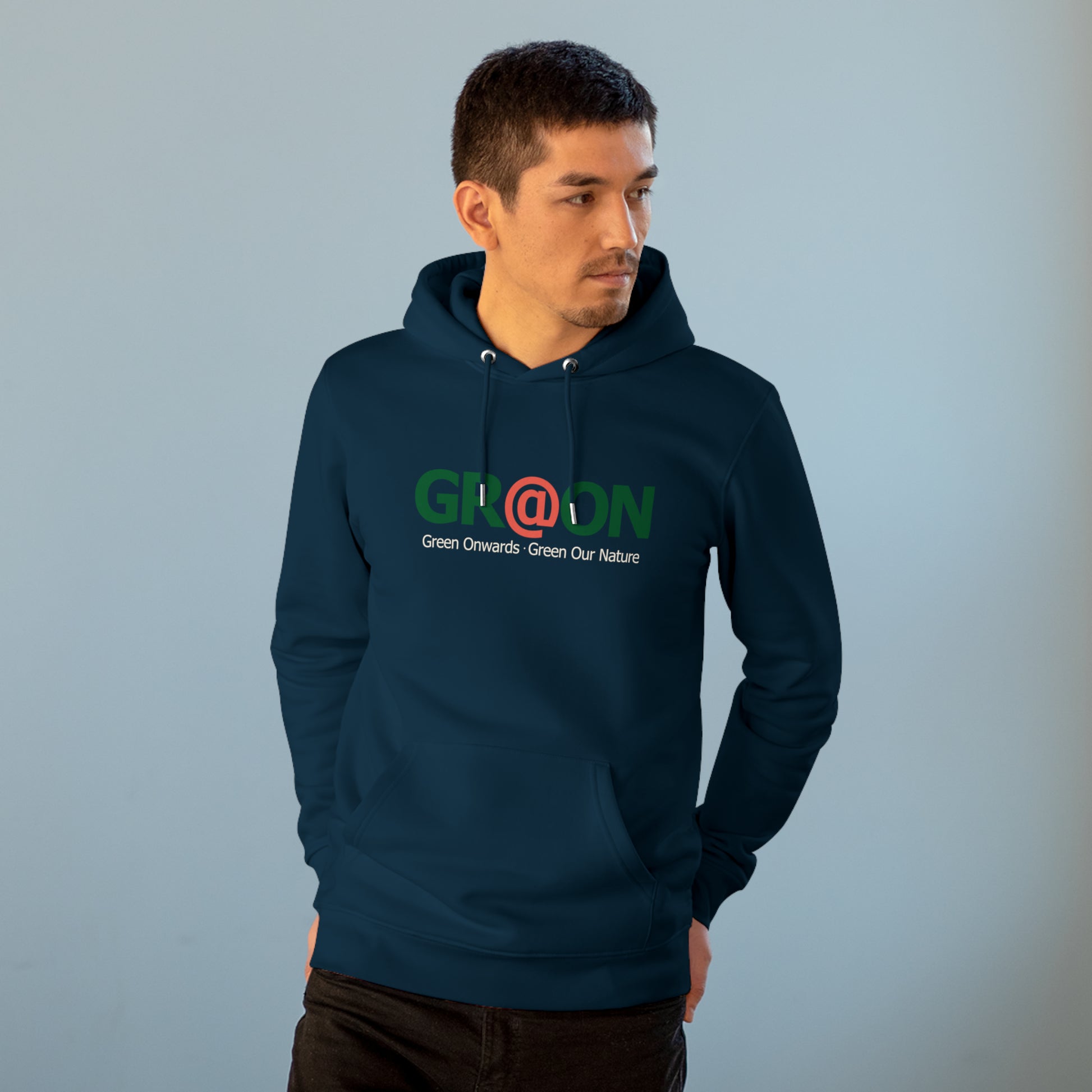 Model wearing a GR@ON Hoodie made from organic cotton, featuring a stylish and sustainable design. GR@ON Hoodies: Sustainable warmth, stylish comfort.