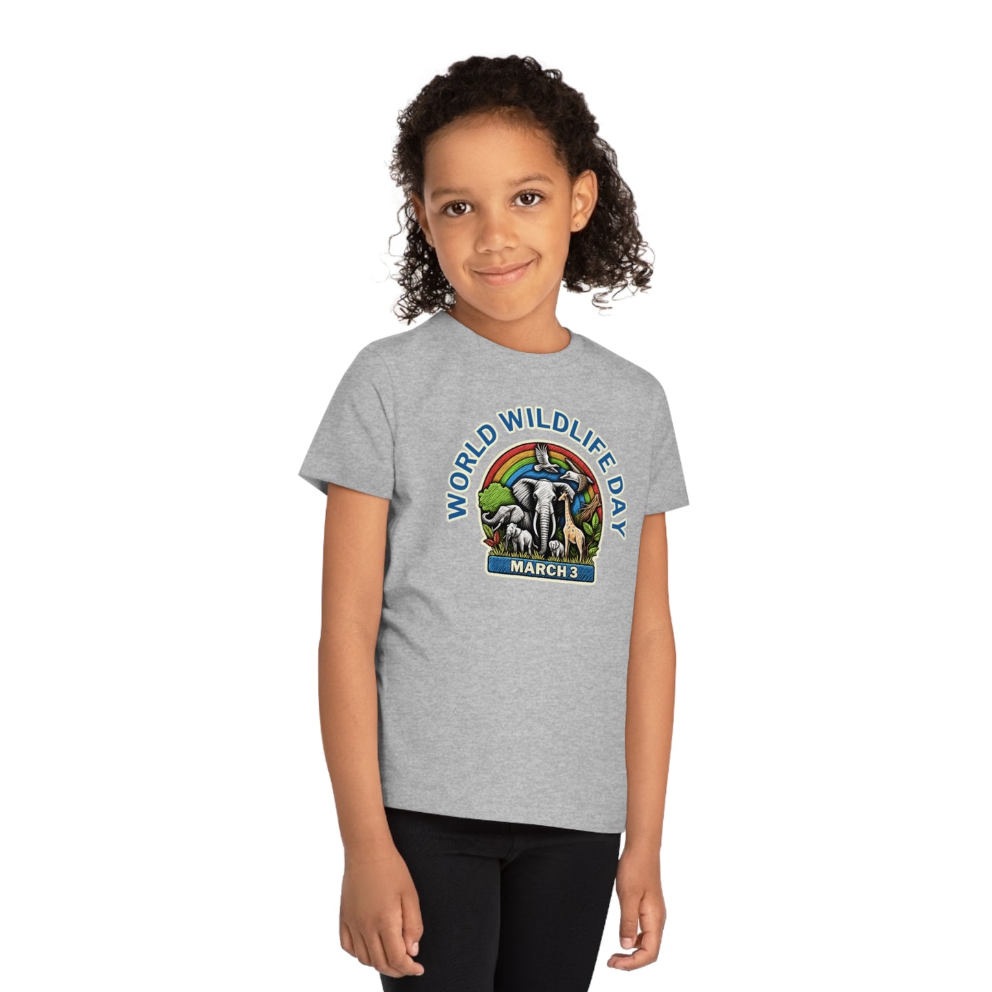 World Wildlife Day, Child wearing a GR@ON Kids T-Shirt made from organic cotton, featuring a fun and colorful design. GR@ON Kids T-Shirts: Sustainable style, fun designs.