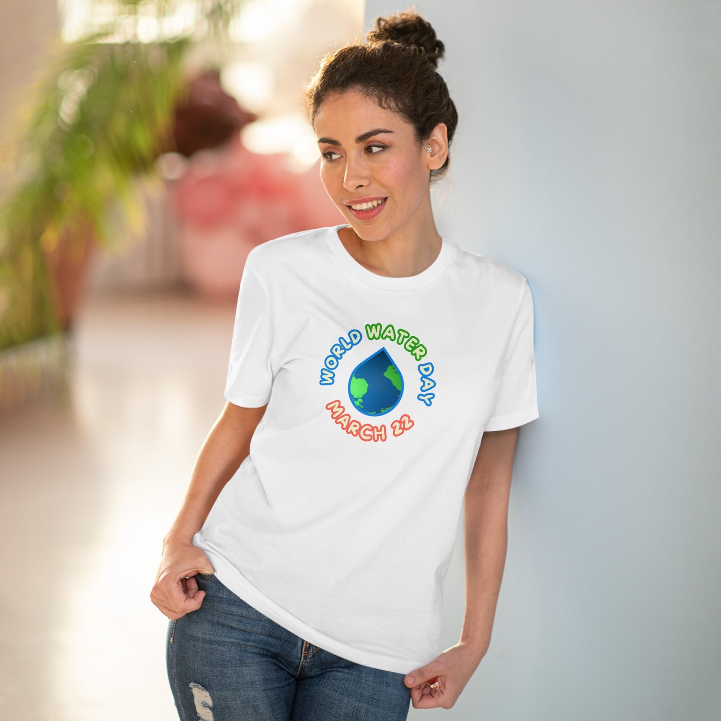 World Water Day, Model wearing a GR@ON T-Shirt made from organic cotton, featuring a stylish and sustainable design. GR@ON T-Shirts: Sustainable style, everyday comfort.