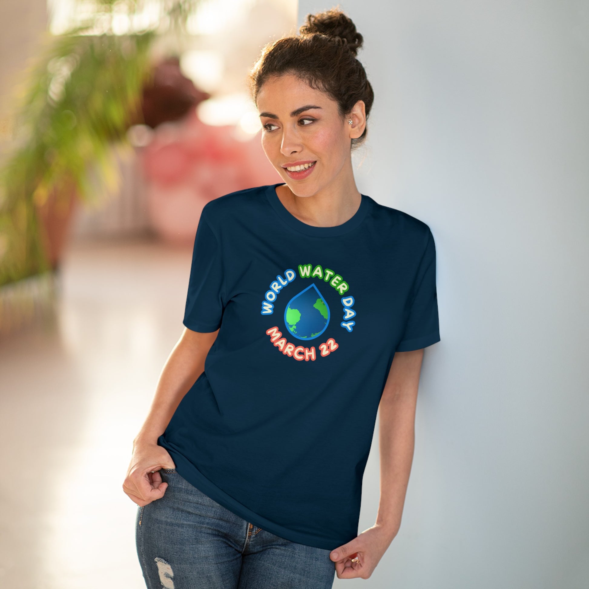 World Water Day, Model wearing a GR@ON T-Shirt made from organic cotton, featuring a stylish and sustainable design. GR@ON T-Shirts: Sustainable style, everyday comfort.