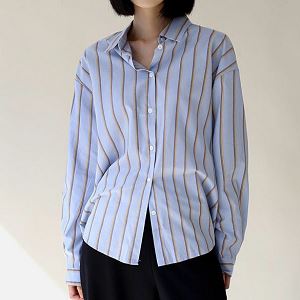 Dongdaemum Women’s Shirts, Tops & T-Shirts, a testament to the elegance and quality of wholesale Korean fashion.