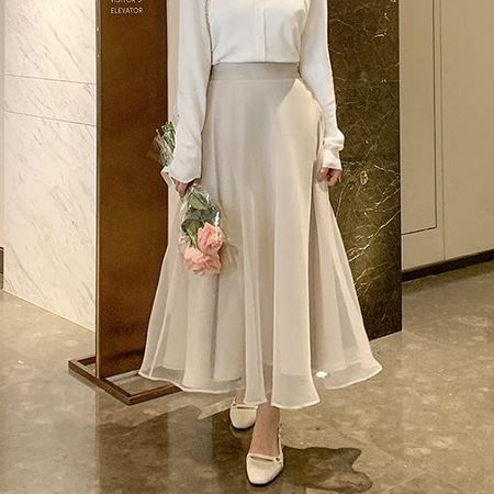 A collection of Dongdaemum Women’s Dresses, encapsulating the charm of Korean fashion.