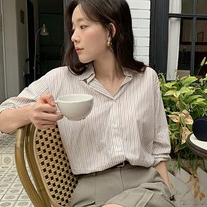 Dongdaemum Women’s Shirts, Tops & T-Shirts, a testament to the elegance and quality of wholesale Korean fashion.