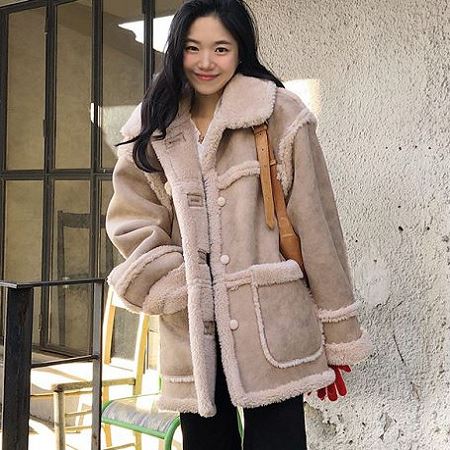 A variety of Dongdaemum Women’s Coats & Jackets, reflecting the sophistication of Korean fashion.