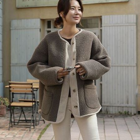 A variety of Dongdaemum Women’s Coats & Jackets, reflecting the sophistication of Korean fashion.