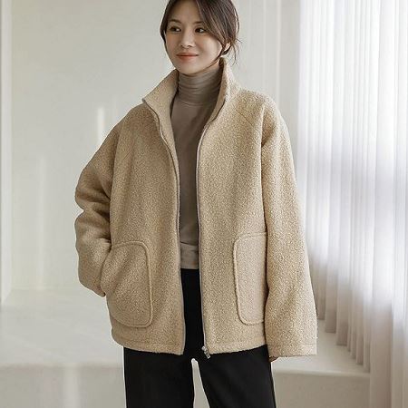 A variety of Dongdaemum Women’s Coats & Jackets, reflecting the sophistication of Korean fashion.