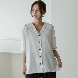 A selection of Dongdaemum Women’s Shirts & Tops, showcasing the best of Korean fashion.