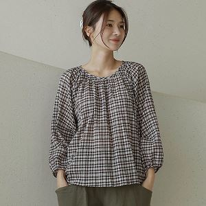 A selection of Dongdaemum Women’s Shirts & Tops, showcasing the best of Korean fashion.