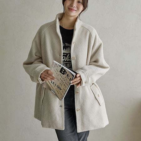 A variety of Dongdaemum Women’s Coats & Jackets, reflecting the sophistication of Korean fashion.