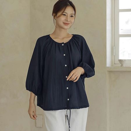 A selection of Dongdaemum Women’s Shirts & Tops, showcasing the best of Korean fashion.