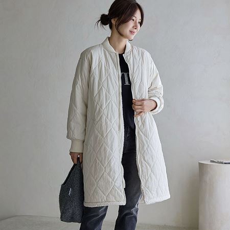 A variety of Dongdaemum Women’s Coats & Jackets, reflecting the sophistication of Korean fashion.