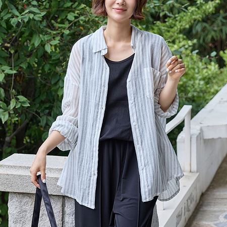 A selection of Dongdaemum Women’s Shirts & Tops, showcasing the best of Korean fashion.