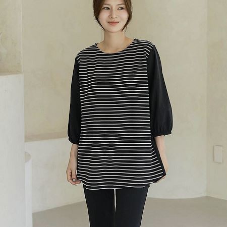 A selection of Dongdaemum Women’s Shirts & Tops, showcasing the best of Korean fashion.