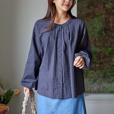 A selection of Dongdaemum Women’s Shirts & Tops, showcasing the best of Korean fashion.
