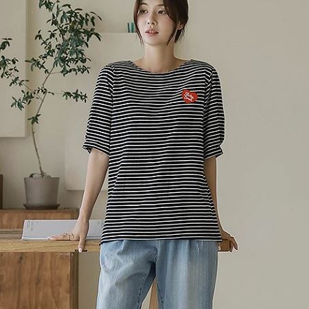A selection of Dongdaemum Women’s Shirts & Tops, showcasing the best of Korean fashion.