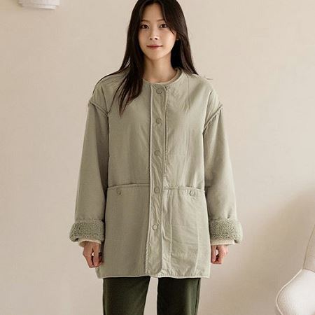 A variety of Dongdaemum Women’s Coats & Jackets, reflecting the sophistication of Korean fashion.