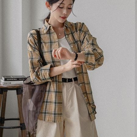 A selection of Dongdaemum Women’s Shirts & Tops, showcasing the best of Korean fashion.