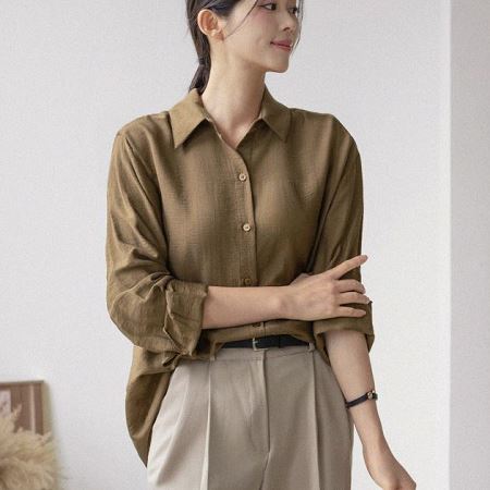 A selection of Dongdaemum Women’s Shirts & Tops, showcasing the best of Korean fashion.