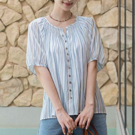 A selection of Dongdaemum Women’s Shirts & Tops, showcasing the best of Korean fashion.