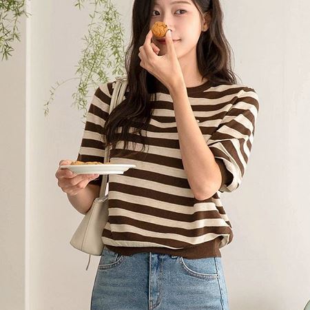 Dongdaemum Women’s Shirts, Tops & T-Shirts, a testament to the elegance and quality of wholesale Korean fashion.