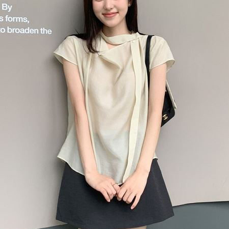 A selection of Dongdaemum Women’s Shirts & Tops, showcasing the best of Korean fashion.
