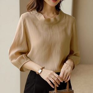 A selection of Dongdaemum Women’s Shirts & Tops, showcasing the best of Korean fashion.