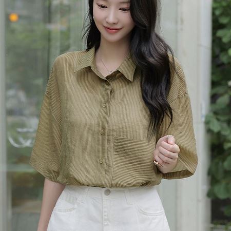 A selection of Dongdaemum Women’s Shirts & Tops, showcasing the best of Korean fashion.