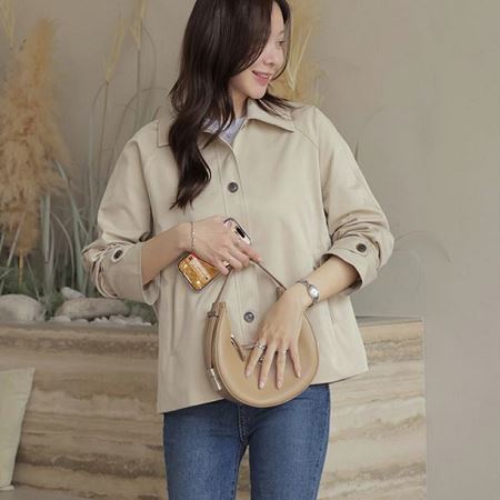 A variety of Dongdaemum Women’s Coats & Jackets, reflecting the sophistication of Korean fashion.