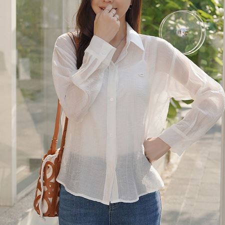 A selection of Dongdaemum Women’s Shirts & Tops, showcasing the best of Korean fashion.