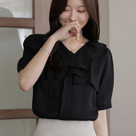 A selection of Dongdaemum Women’s Shirts & Tops, showcasing the best of Korean fashion.