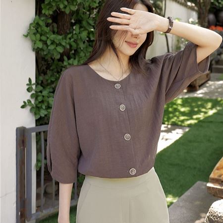 A selection of Dongdaemum Women’s Shirts & Tops, showcasing the best of Korean fashion.