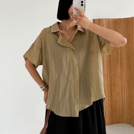 Dongdaemum Women’s Shirts, Tops & T-Shirts, a testament to the elegance and quality of wholesale Korean fashion.