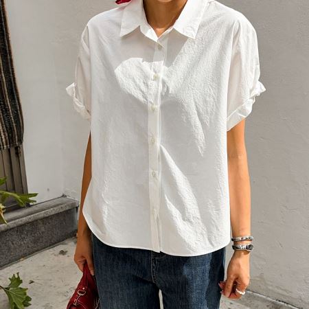 Dongdaemum Women’s Shirts, Tops & T-Shirts, a testament to the elegance and quality of wholesale Korean fashion.