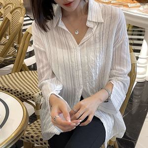 A selection of Dongdaemum Women’s Shirts & Tops, showcasing the best of Korean fashion.