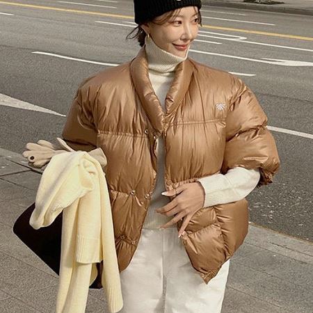 A variety of Dongdaemum Women’s Coats & Jackets, reflecting the sophistication of Korean fashion.