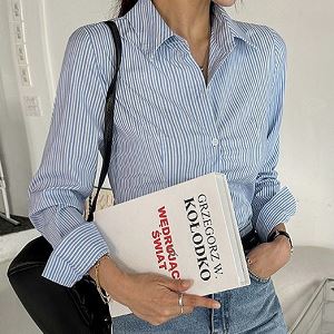 A selection of Dongdaemum Women’s Shirts & Tops, showcasing the best of Korean fashion.