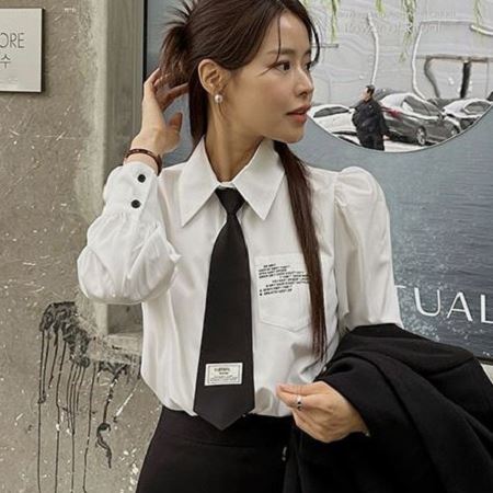 A selection of Dongdaemum Women’s Shirts & Tops, showcasing the best of Korean fashion.