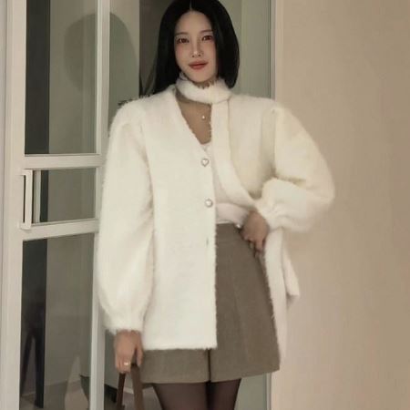 A variety of Dongdaemum Women’s Coats & Jackets, reflecting the sophistication of Korean fashion.