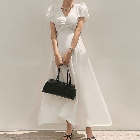 A collection of Dongdaemum Women’s Dresses, encapsulating the charm of Korean fashion.