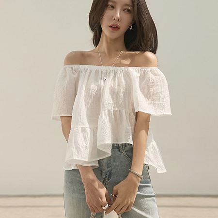 A selection of Dongdaemum Women’s Shirts & Tops, showcasing the best of Korean fashion.