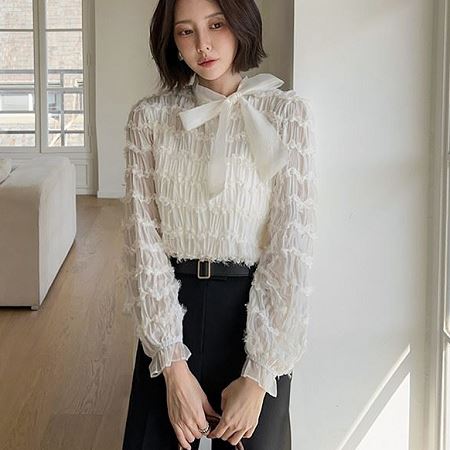 A selection of Dongdaemum Women’s Shirts & Tops, showcasing the best of Korean fashion.
