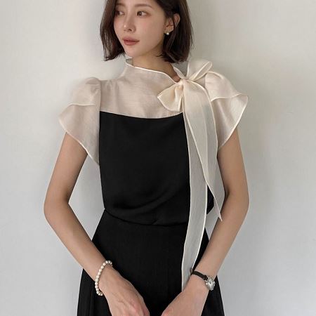A selection of Dongdaemum Women’s Shirts & Tops, showcasing the best of Korean fashion.