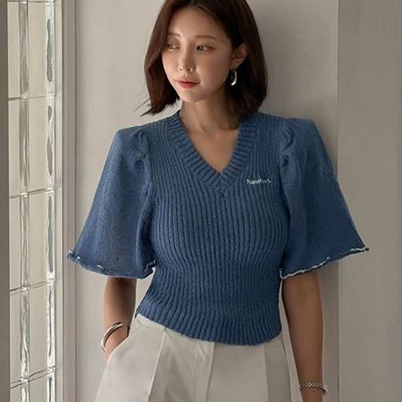 A selection of Dongdaemum Women’s Shirts & Tops, showcasing the best of Korean fashion.