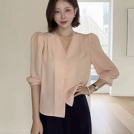 Dongdaemum Women’s Shirts, Tops & T-Shirts, a testament to the elegance and quality of wholesale Korean fashion.