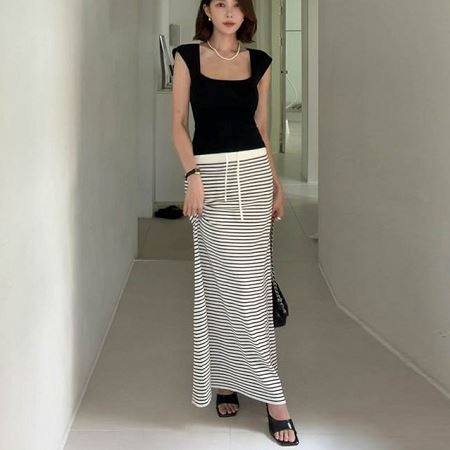 A variety of Dongdaemum Women’s One-Pieces, representing the allure of Korean fashion.